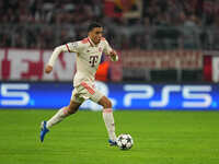 Jamal Musiala of Bayern Munich  controls the ball  during the Champions League Round 1 match between Bayern Munich v Dinamo Zagreb, at the A...