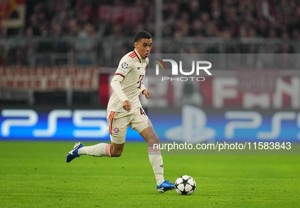 Jamal Musiala of Bayern Munich  controls the ball  during the Champions League Round 1 match between Bayern Munich v Dinamo Zagreb, at the A...