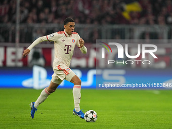 Jamal Musiala of Bayern Munich  controls the ball  during the Champions League Round 1 match between Bayern Munich v Dinamo Zagreb, at the A...