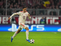 Jamal Musiala of Bayern Munich  controls the ball  during the Champions League Round 1 match between Bayern Munich v Dinamo Zagreb, at the A...