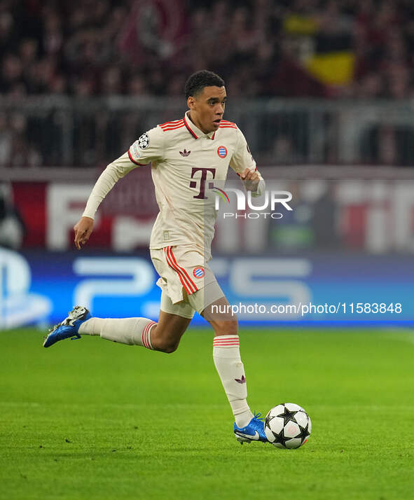 Jamal Musiala of Bayern Munich  controls the ball  during the Champions League Round 1 match between Bayern Munich v Dinamo Zagreb, at the A...