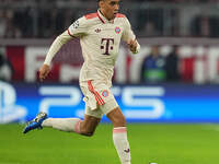 Jamal Musiala of Bayern Munich  controls the ball  during the Champions League Round 1 match between Bayern Munich v Dinamo Zagreb, at the A...