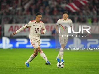 Jamal Musiala of Bayern Munich  controls the ball  during the Champions League Round 1 match between Bayern Munich v Dinamo Zagreb, at the A...