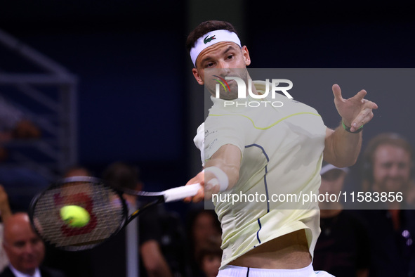 Bulgaria's Grigor Dimitrov plays during his tennis gala match against Serbia's Novak Djokovic at Arena Sofia hall in Sofia, Bulgaria, on Sep...