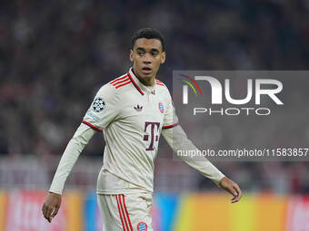 Jamal Musiala of Bayern Munich  controls the ball  during the Champions League Round 1 match between Bayern Munich v Dinamo Zagreb, at the A...