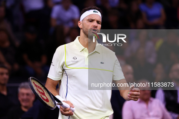 Bulgaria's Grigor Dimitrov reacts during his tennis gala match against Serbia's Novak Djokovic in Sofia, Bulgaria, on September 17, 2024. 