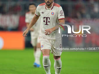 Harry Kane of Bayern Munich  controls the ball  during the Champions League Round 1 match between Bayern Munich v Dinamo Zagreb, at the Alli...