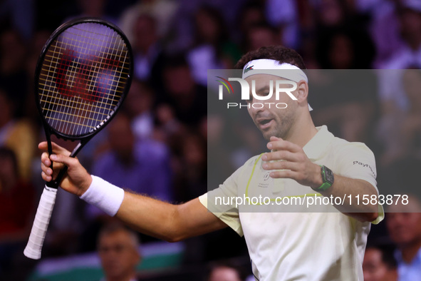 Bulgaria's Grigor Dimitrov reacts during his tennis gala match against Serbia's Novak Djokovic in Sofia, Bulgaria, on September 17, 2024. 