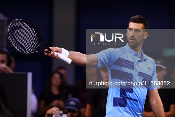 Serbia's Novak Djokovic reacts during his tennis gala match against Bulgaria's Grigor Dimitrov in Sofia, Bulgaria, on September 17, 2024. 