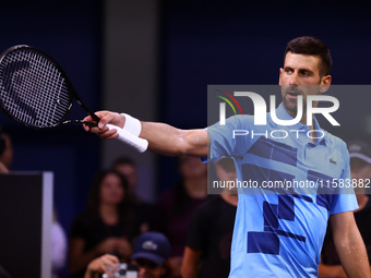 Serbia's Novak Djokovic reacts during his tennis gala match against Bulgaria's Grigor Dimitrov in Sofia, Bulgaria, on September 17, 2024. (