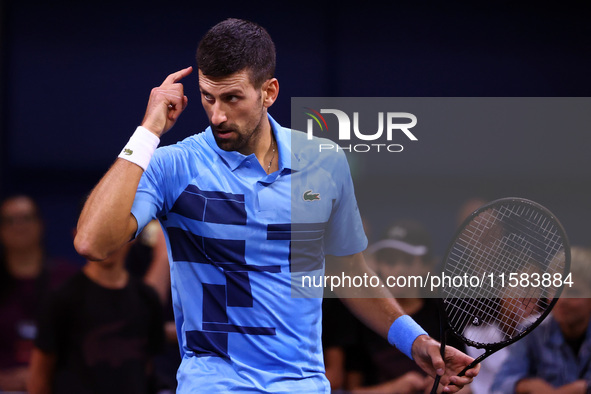 Serbia's Novak Djokovic reacts during his tennis gala match against Bulgaria's Grigor Dimitrov in Sofia, Bulgaria, on September 17, 2024. 