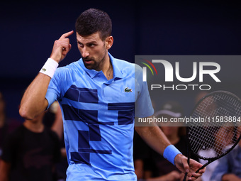 Serbia's Novak Djokovic reacts during his tennis gala match against Bulgaria's Grigor Dimitrov in Sofia, Bulgaria, on September 17, 2024. (