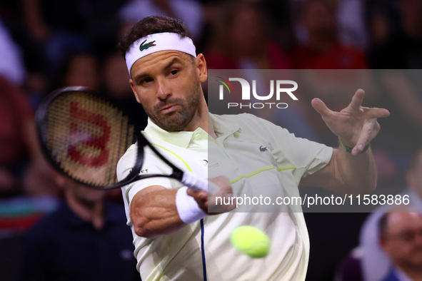 Bulgaria's Grigor Dimitrov plays during his tennis gala match against Serbia's Novak Djokovic at Arena Sofia hall in Sofia, Bulgaria, on Sep...