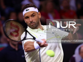 Bulgaria's Grigor Dimitrov plays during his tennis gala match against Serbia's Novak Djokovic at Arena Sofia hall in Sofia, Bulgaria, on Sep...