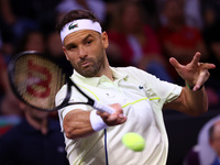 Bulgaria's Grigor Dimitrov plays during his tennis gala match against Serbia's Novak Djokovic at Arena Sofia hall in Sofia, Bulgaria, on Sep...