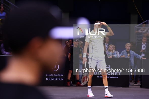 Bulgaria's Grigor Dimitrov plays during his tennis gala match against Serbia's Novak Djokovic at Arena Sofia hall in Sofia, Bulgaria, on Sep...