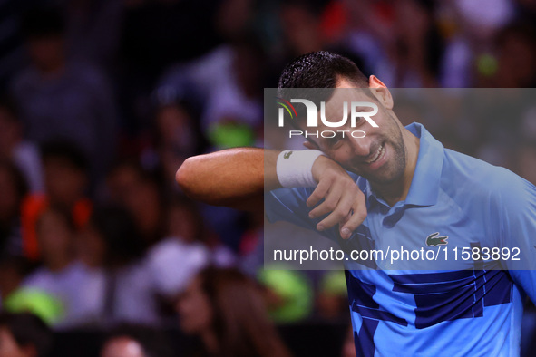 Serbia's Novak Djokovic reacts during his tennis gala match against Bulgaria's Grigor Dimitrov in Sofia, Bulgaria, on September 17, 2024. 