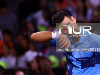 Serbia's Novak Djokovic reacts during his tennis gala match against Bulgaria's Grigor Dimitrov in Sofia, Bulgaria, on September 17, 2024. (