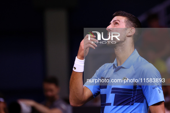 Serbia's Novak Djokovic reacts during his tennis gala match against Bulgaria's Grigor Dimitrov in Sofia, Bulgaria, on September 17, 2024. 