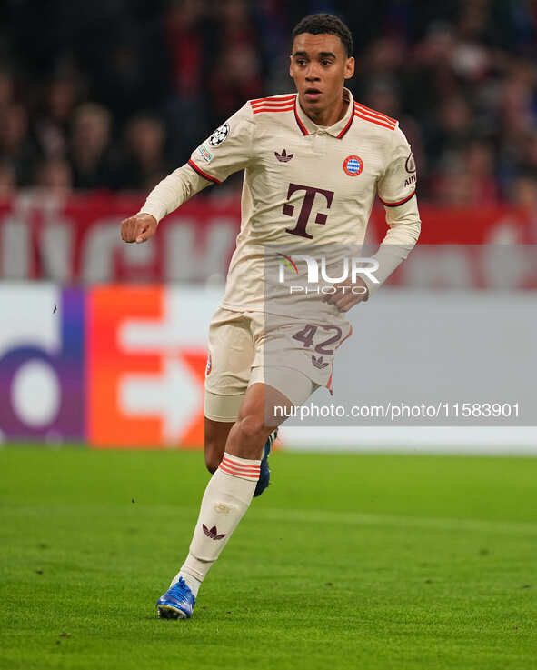 Jamal Musiala of Bayern Munich  looks on  during the Champions League Round 1 match between Bayern Munich v Dinamo Zagreb, at the Allianz Ar...