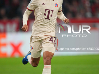 Jamal Musiala of Bayern Munich  looks on  during the Champions League Round 1 match between Bayern Munich v Dinamo Zagreb, at the Allianz Ar...