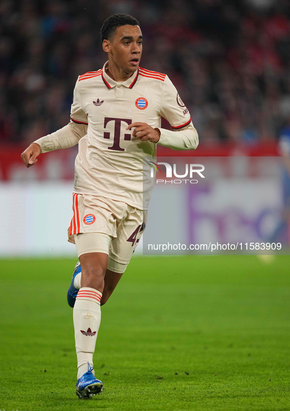 Jamal Musiala of Bayern Munich  looks on  during the Champions League Round 1 match between Bayern Munich v Dinamo Zagreb, at the Allianz Ar...