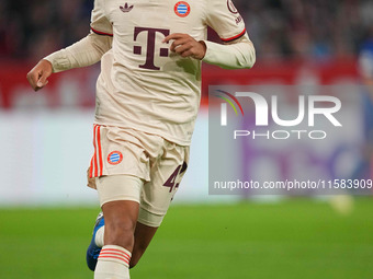 Jamal Musiala of Bayern Munich  looks on  during the Champions League Round 1 match between Bayern Munich v Dinamo Zagreb, at the Allianz Ar...