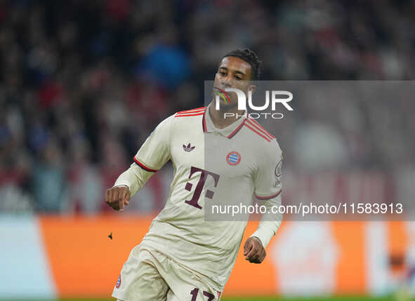 Michael Olise of Bayern Munich  looks on  during the Champions League Round 1 match between Bayern Munich v Dinamo Zagreb, at the Allianz Ar...