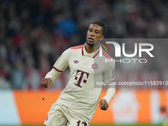 Michael Olise of Bayern Munich  looks on  during the Champions League Round 1 match between Bayern Munich v Dinamo Zagreb, at the Allianz Ar...