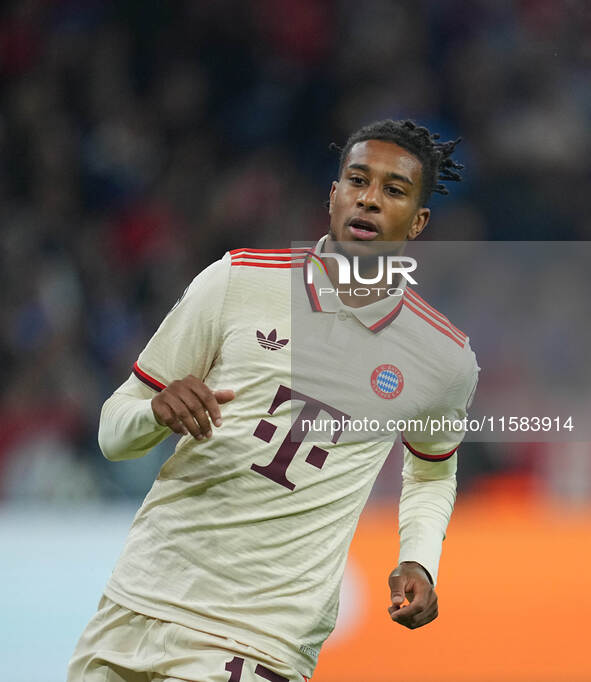 Michael Olise of Bayern Munich  looks on  during the Champions League Round 1 match between Bayern Munich v Dinamo Zagreb, at the Allianz Ar...