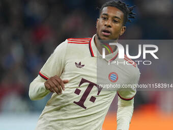 Michael Olise of Bayern Munich  looks on  during the Champions League Round 1 match between Bayern Munich v Dinamo Zagreb, at the Allianz Ar...