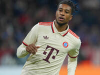 Michael Olise of Bayern Munich  looks on  during the Champions League Round 1 match between Bayern Munich v Dinamo Zagreb, at the Allianz Ar...