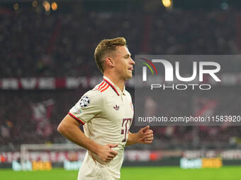 Joshua Kimmich of Bayern Munich  looks on  during the Champions League Round 1 match between Bayern Munich v Dinamo Zagreb, at the Allianz A...