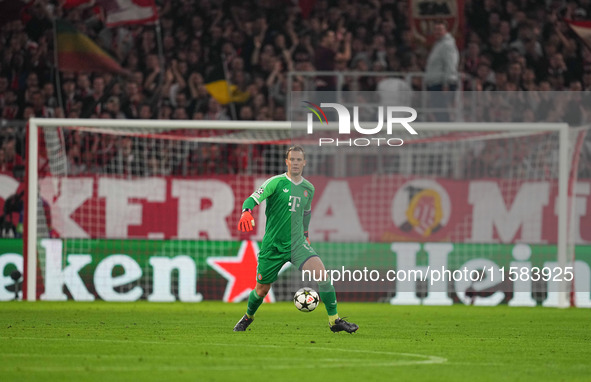 Manuel Neuer of Bayern Munich  controls the ball  during the Champions League Round 1 match between Bayern Munich v Dinamo Zagreb, at the Al...