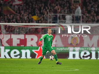 Manuel Neuer of Bayern Munich  controls the ball  during the Champions League Round 1 match between Bayern Munich v Dinamo Zagreb, at the Al...