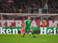 Manuel Neuer of Bayern Munich  controls the ball  during the Champions League Round 1 match between Bayern Munich v Dinamo Zagreb, at the Al...