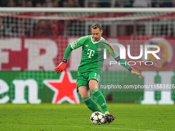 Manuel Neuer of Bayern Munich  controls the ball  during the Champions League Round 1 match between Bayern Munich v Dinamo Zagreb, at the Al...