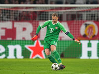 Manuel Neuer of Bayern Munich  controls the ball  during the Champions League Round 1 match between Bayern Munich v Dinamo Zagreb, at the Al...