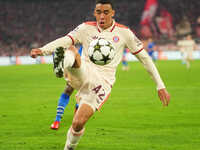 Jamal Musiala of Bayern Munich  controls the ball  during the Champions League Round 1 match between Bayern Munich v Dinamo Zagreb, at the A...