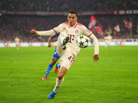 Jamal Musiala of Bayern Munich  controls the ball  during the Champions League Round 1 match between Bayern Munich v Dinamo Zagreb, at the A...