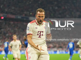 Harry Kane of Bayern Munich  celebrates  the teams first goal  during the Champions League Round 1 match between Bayern Munich v Dinamo Zagr...