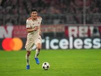 Minjae Kim of Bayern Munich  controls the ball  during the Champions League Round 1 match between Bayern Munich v Dinamo Zagreb, at the Alli...