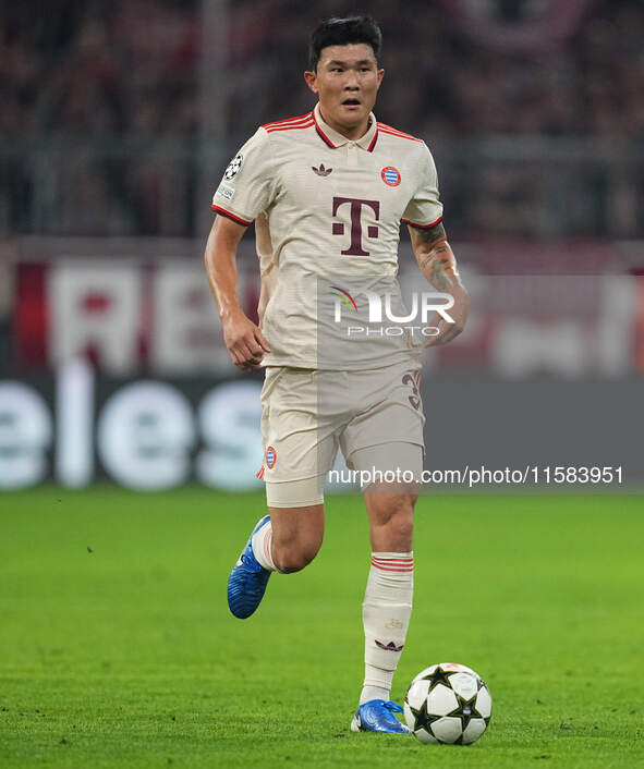 Minjae Kim of Bayern Munich  controls the ball  during the Champions League Round 1 match between Bayern Munich v Dinamo Zagreb, at the Alli...