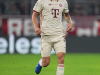 Minjae Kim of Bayern Munich  controls the ball  during the Champions League Round 1 match between Bayern Munich v Dinamo Zagreb, at the Alli...