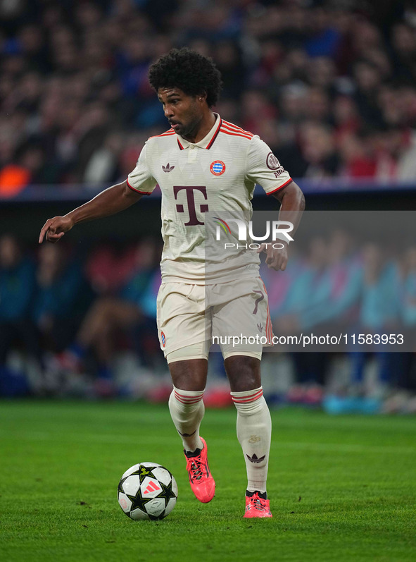 Serge Gnabry of Bayern Munich  controls the ball  during the Champions League Round 1 match between Bayern Munich v Dinamo Zagreb, at the Al...