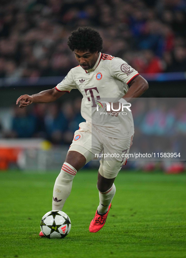 Serge Gnabry of Bayern Munich  controls the ball  during the Champions League Round 1 match between Bayern Munich v Dinamo Zagreb, at the Al...