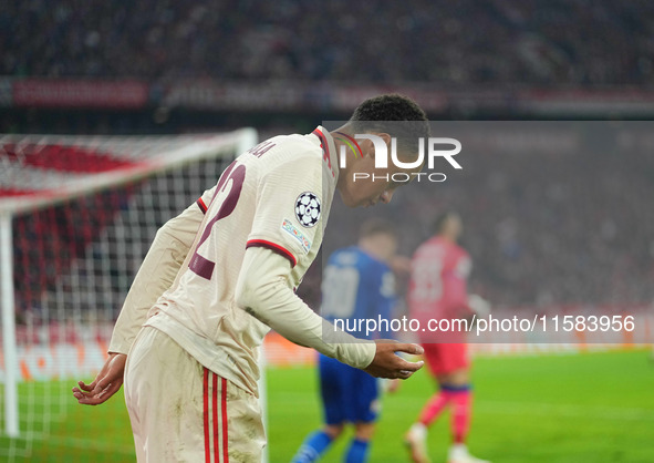 Jamal Musiala of Bayern Munich  looks on  during the Champions League Round 1 match between Bayern Munich v Dinamo Zagreb, at the Allianz Ar...