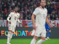 Michael Olise of Bayern Munich  looks on  during the Champions League Round 1 match between Bayern Munich v Dinamo Zagreb, at the Allianz Ar...