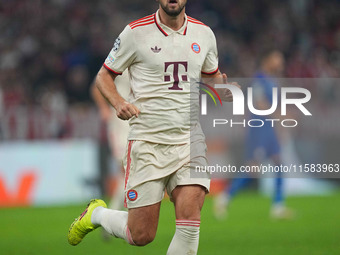 Harry Kane of Bayern Munich  controls the ball  during the Champions League Round 1 match between Bayern Munich v Dinamo Zagreb, at the Alli...