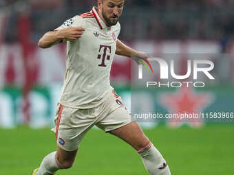 Harry Kane of Bayern Munich  controls the ball  during the Champions League Round 1 match between Bayern Munich v Dinamo Zagreb, at the Alli...